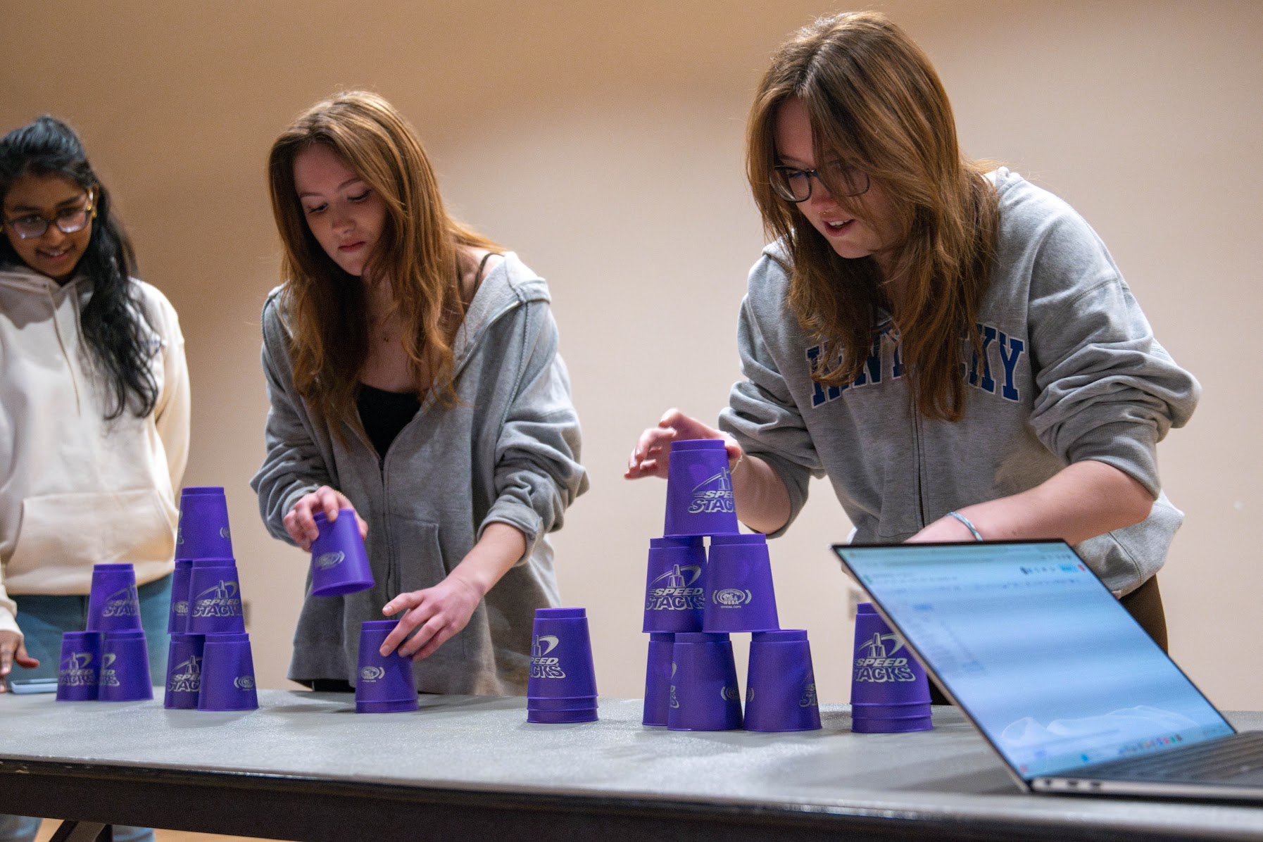Students competing at cup stacking