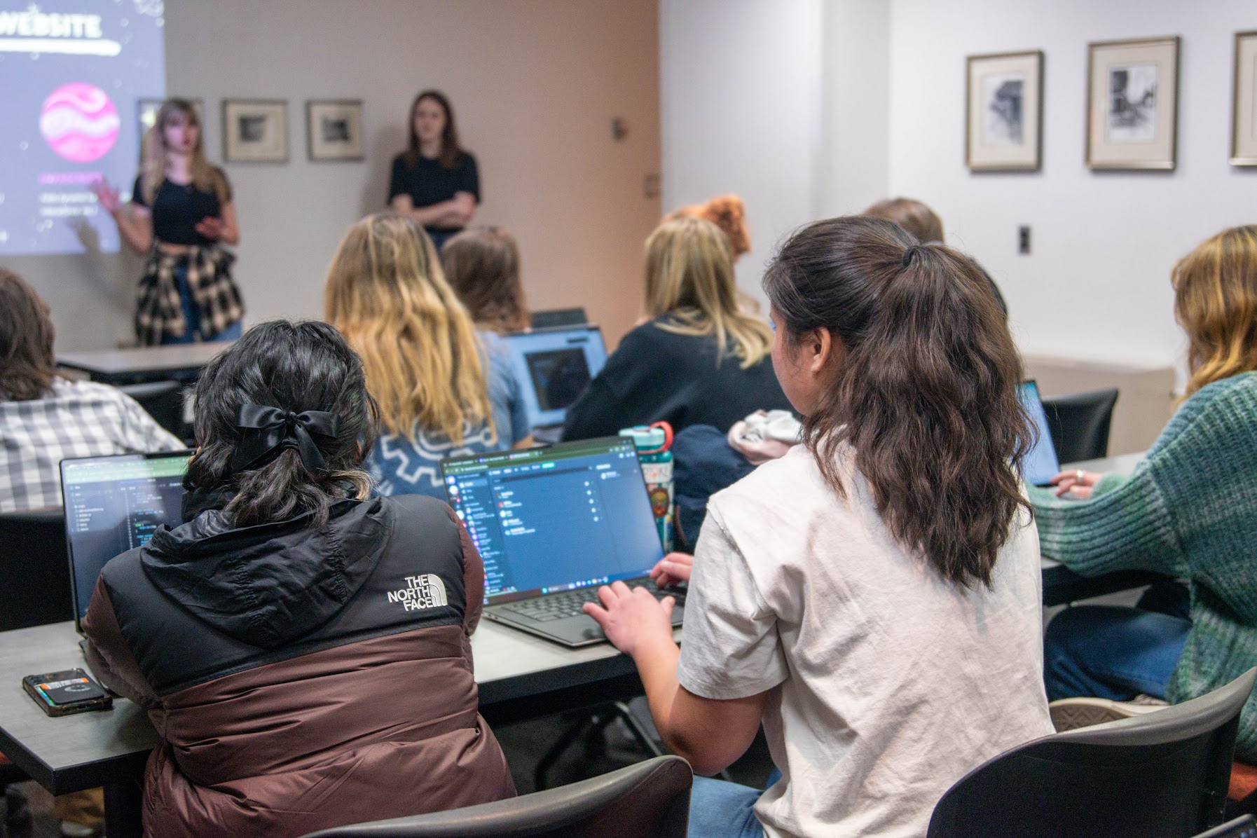 Students coding in a workshop